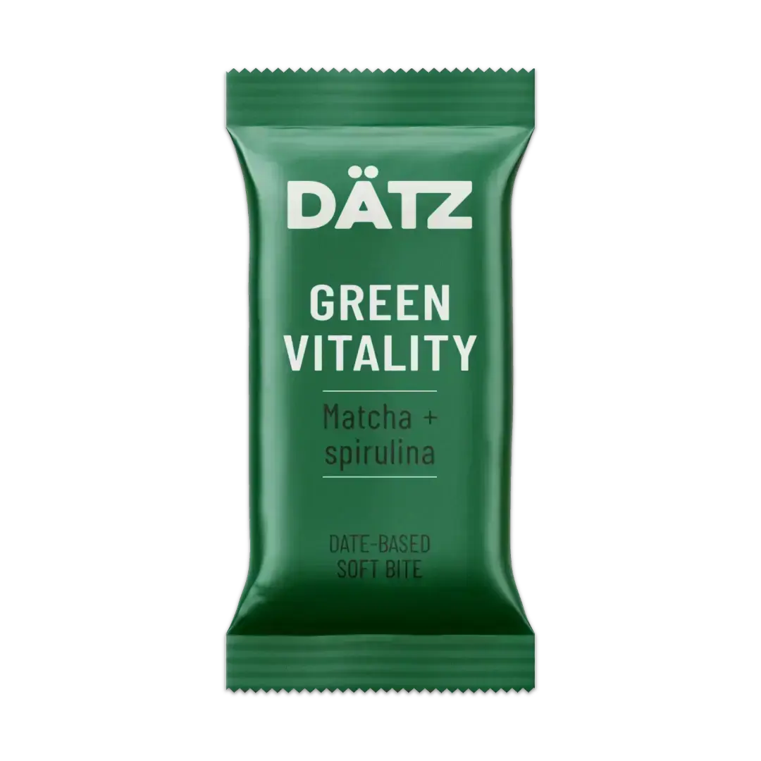 Green package of Dätz Green Vitality with matcha and spirulina on a white background