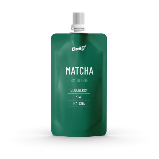 Green pouch of Daily Matcha Smoothie with blueberry, kiwi, and matcha flavors on a white background.